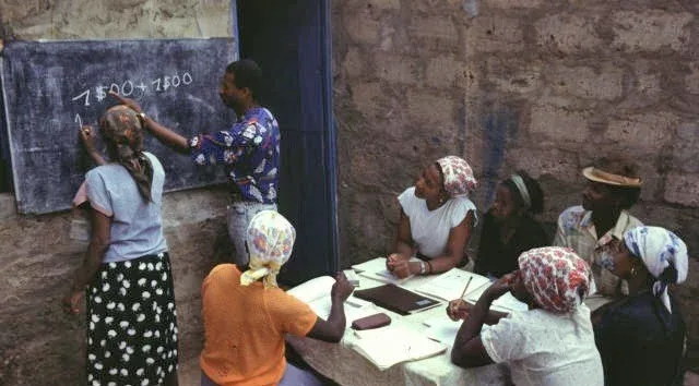 women in an adult literacy class