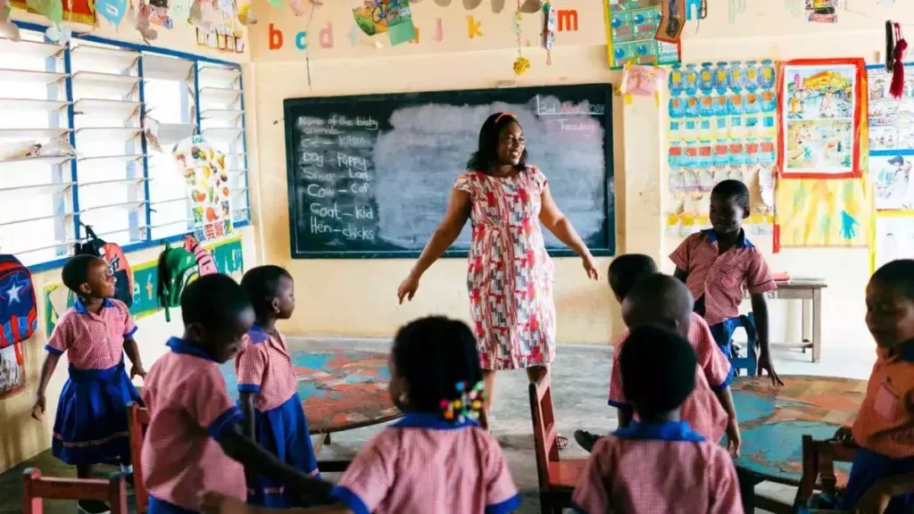 teacher with kindergarten pupils in class in Ghana