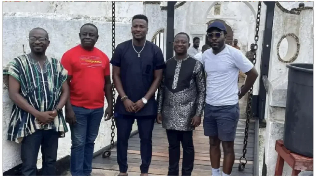 picture of Asamoah Gyan with other members at Cape Coast Castle