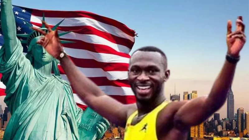 photo of benjamin azamati smiling wide on a US flag