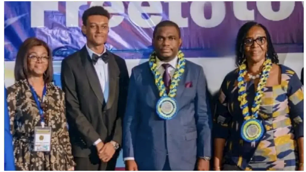 picture of Dr. Eric Nkansah with one of the Ghanaian awardees and others