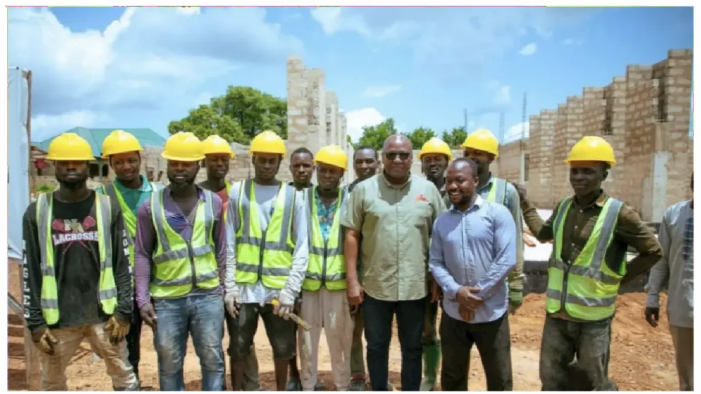 Picture of John Mahama and construction workers