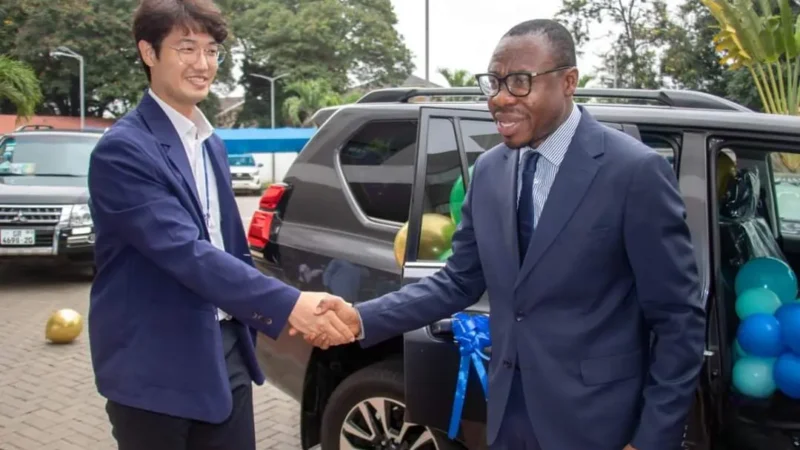 Picture of NHIA receiving landcruiser vehicle from Korean Healthcare Foundation