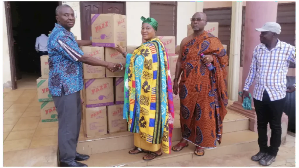 Sekyere Kumawu Education Director receiving Pads Donation