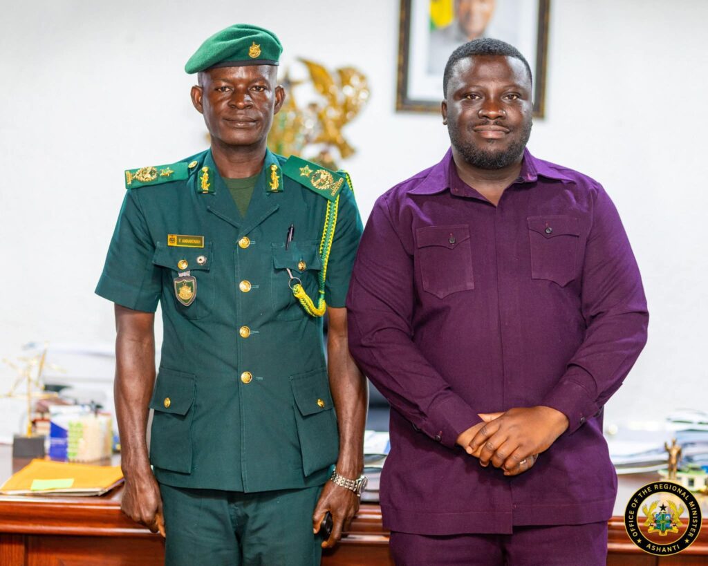 Dr. Amoakohene with Ghana Immigration Service Commander
